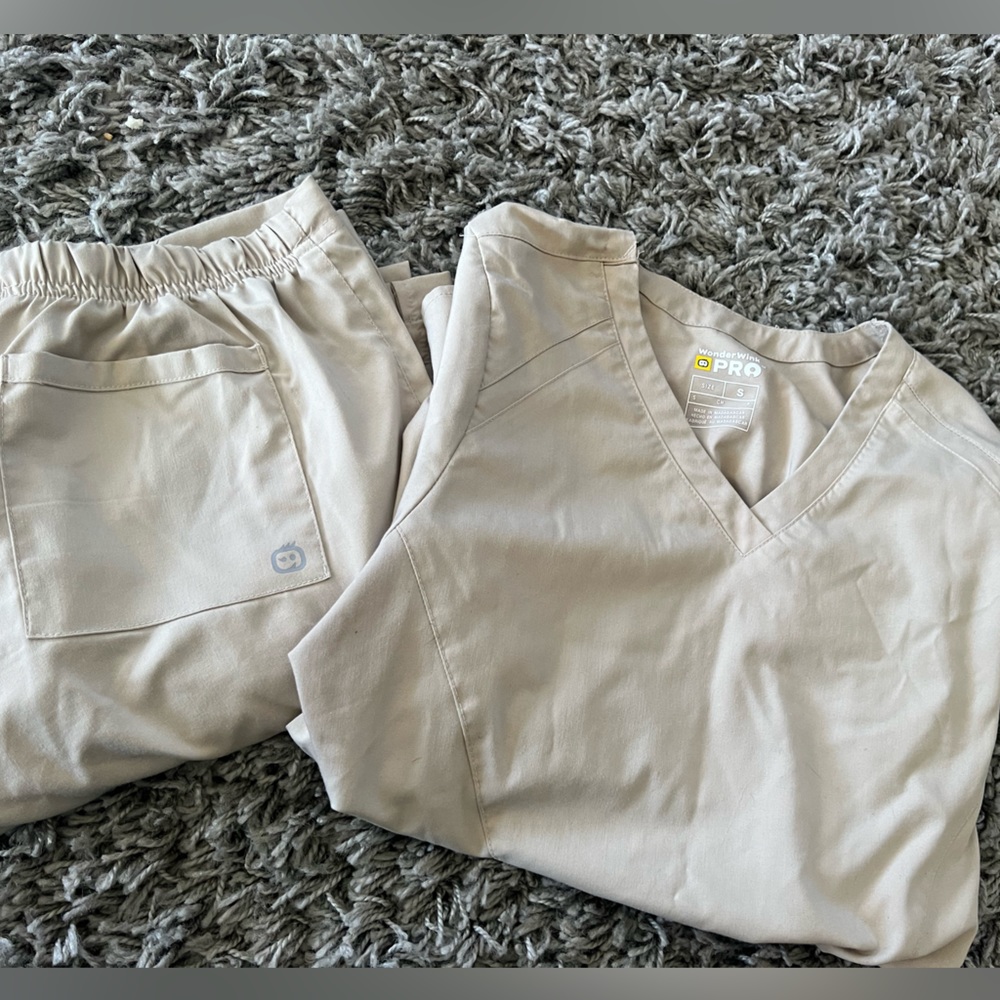 Tan, small, wonder wink scrubs regular